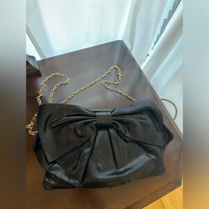 Authentic Valentino (Red) clutch black.